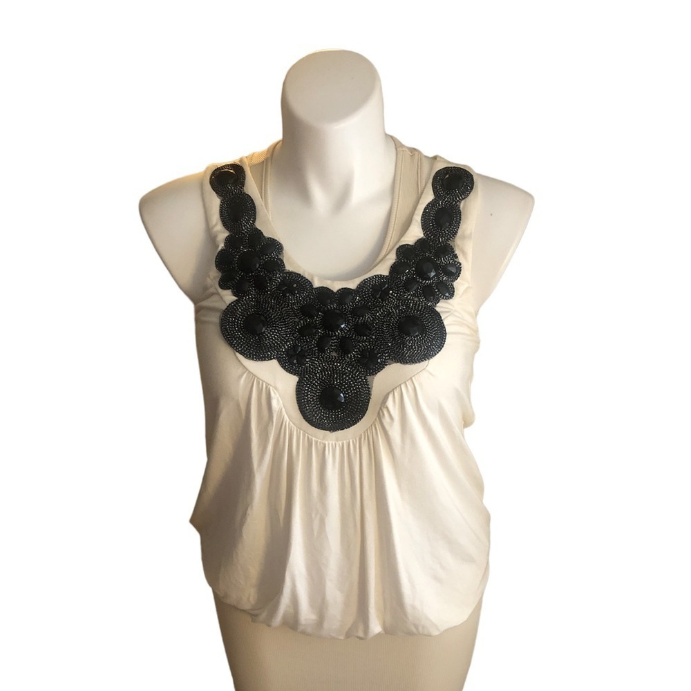 🌺BEBE embellished razor back white blouse in Mint condition. Size M